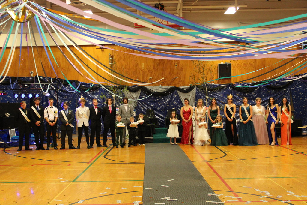 This year's prom court with last year's prom court and crown bearers. 